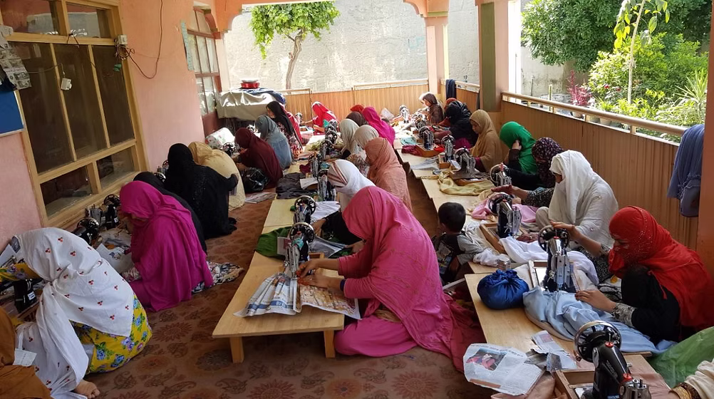 Women in a vocational tailoring class at a Saheli Center